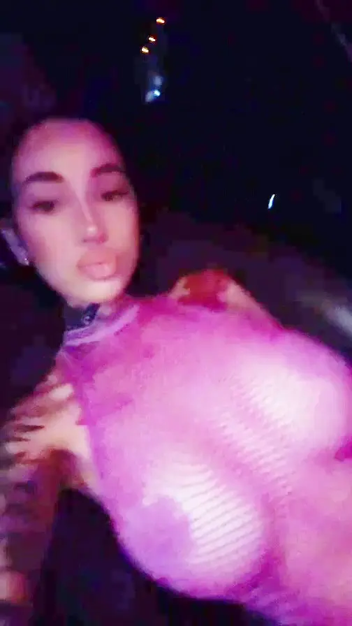 Bhad Bhabie posing, you can see her big tits and nipple thru clothes